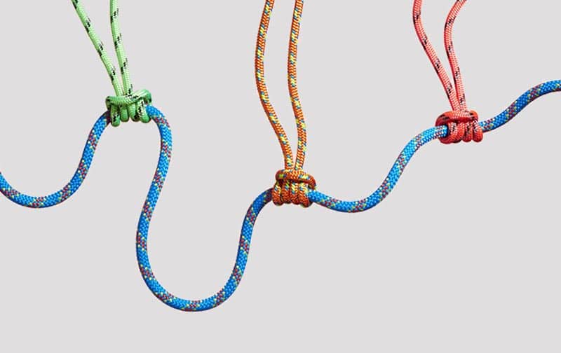 green, orange, and red rope attached to a blue rope